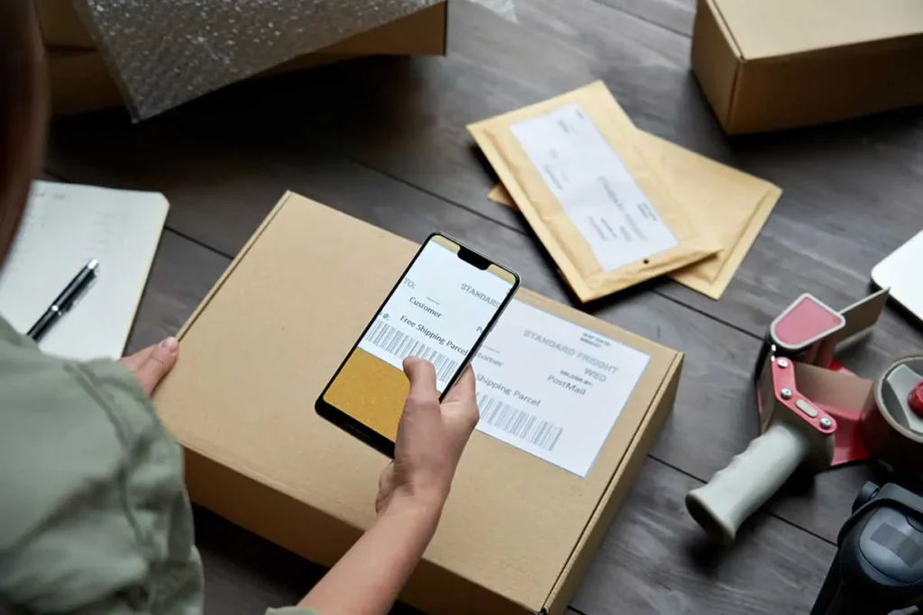What is scheduled delivery person scanning a package barcode to confirm a planned delivery time