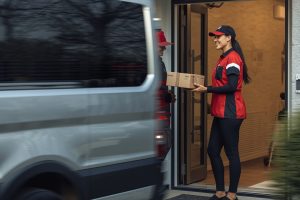 Courier delivering a package with speed and reliability.